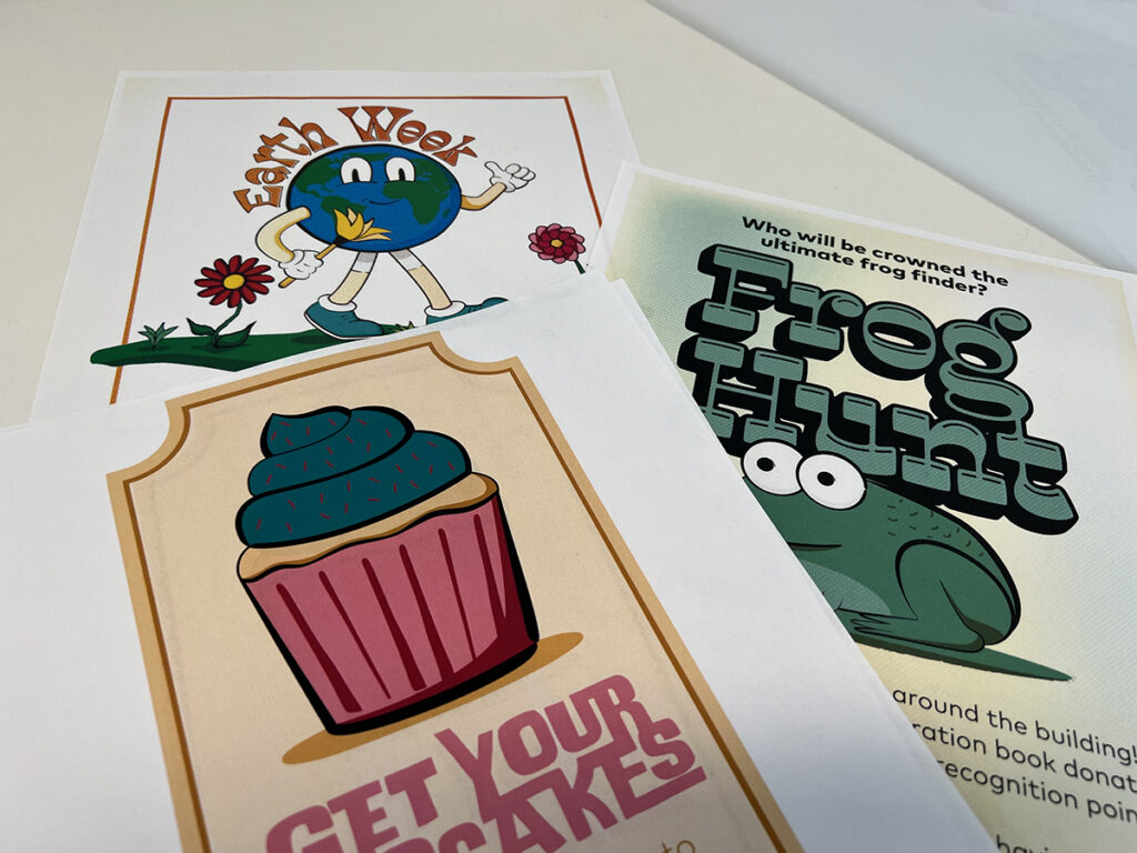 Photograph of posters laying on table